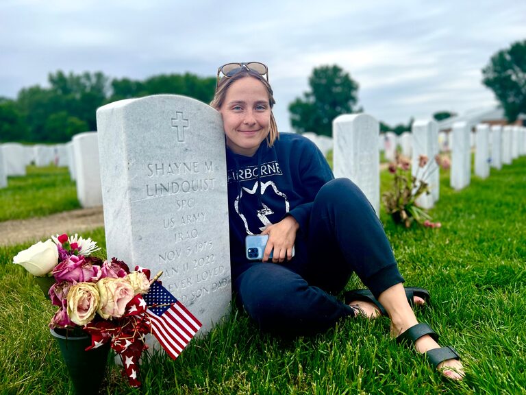Marble military headstone for Shayne M. Lindquist, SPC U.S. Army, at Fort Snelling National Cemetery, Section 33, inscribed 'Ever Loved Son Dad'.